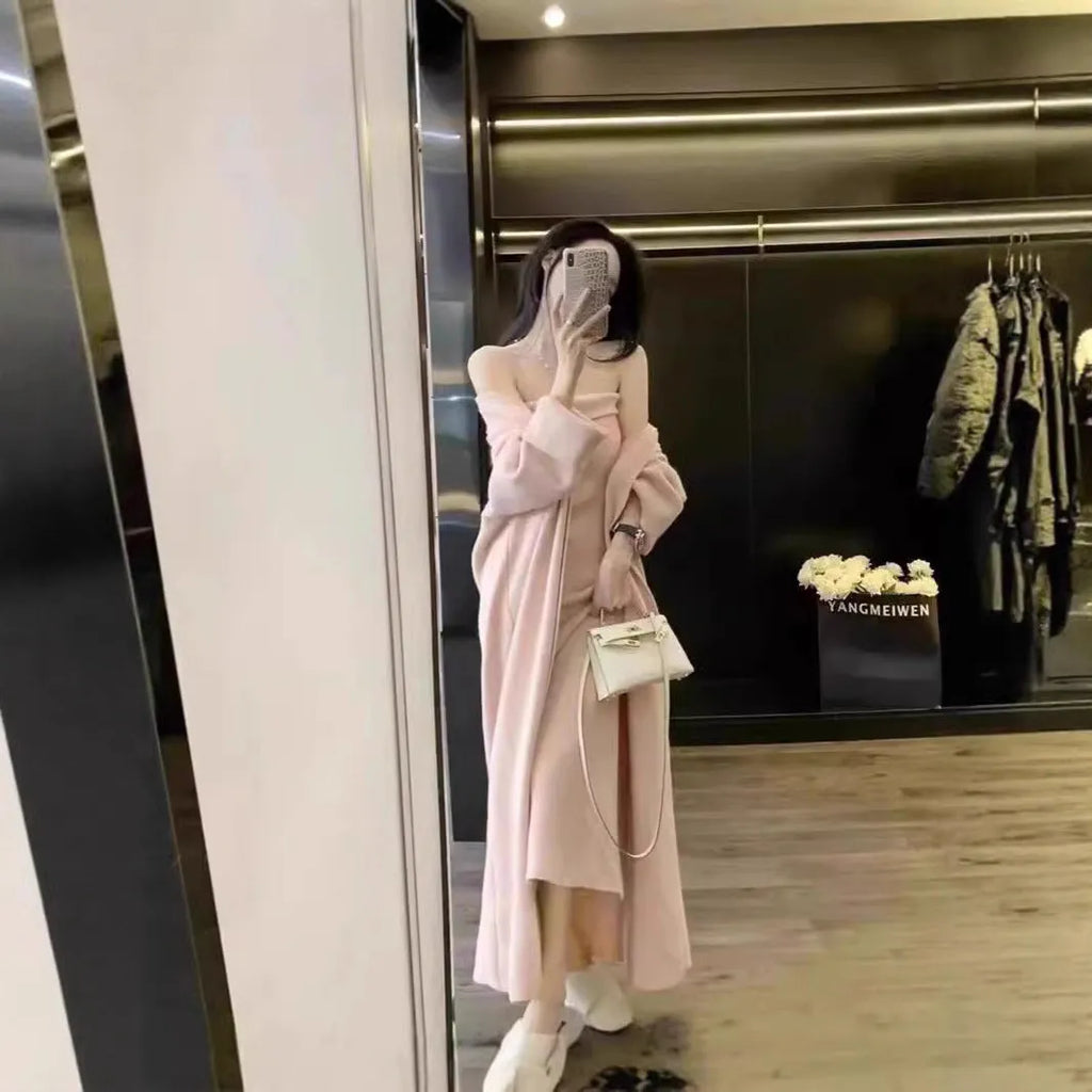 Women's grey knitted dress and matching coat suit with flocked pattern, long skirt, and regular sleeves.