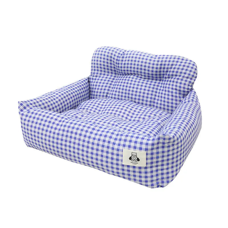 Car-mounted pet travel nest in stain-resistant cloth fabric showing grey and blue plaid colour options