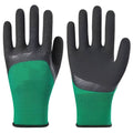 Black and green medium-sized rubber work gloves with visible stitching, shown on a workbench.