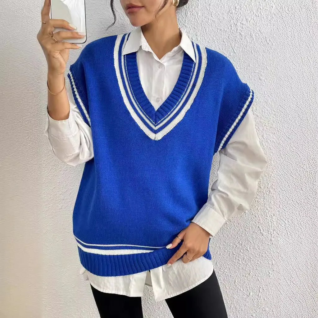 Women's loose fit pullover vest sweater in a college style, shown in blue.