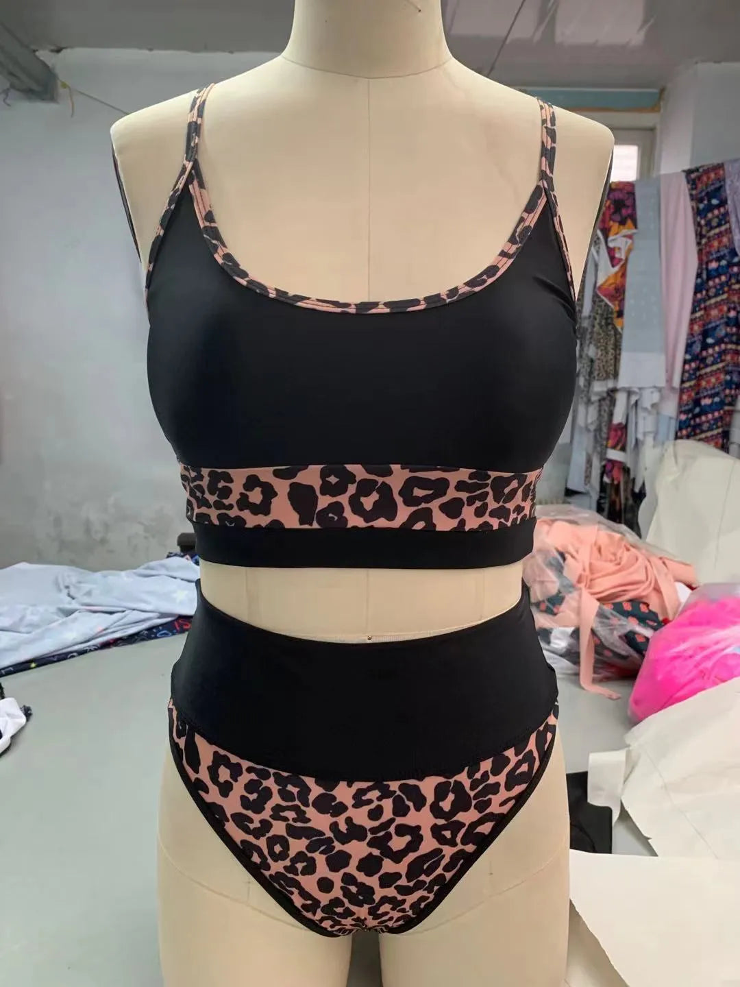 Women's high waist split bikini swimsuit in nylon fabric available in white and leopard print patterns