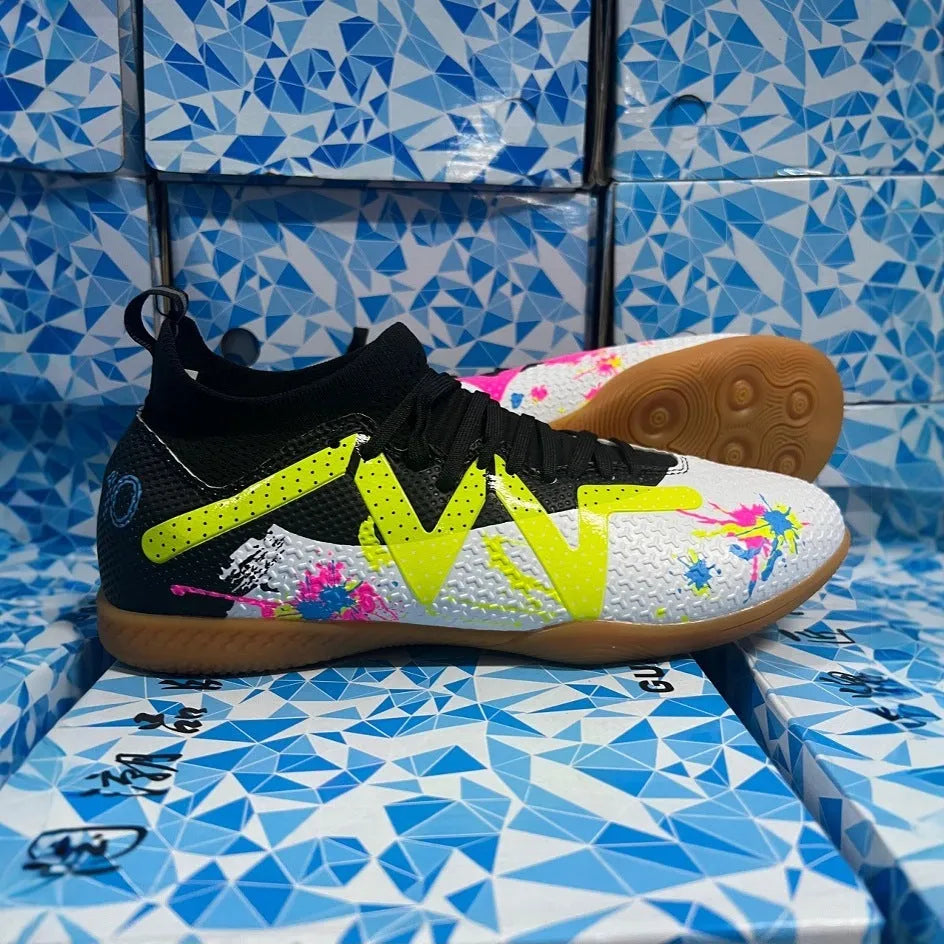 Football boots with removable moulded studs in black and yellow colour option