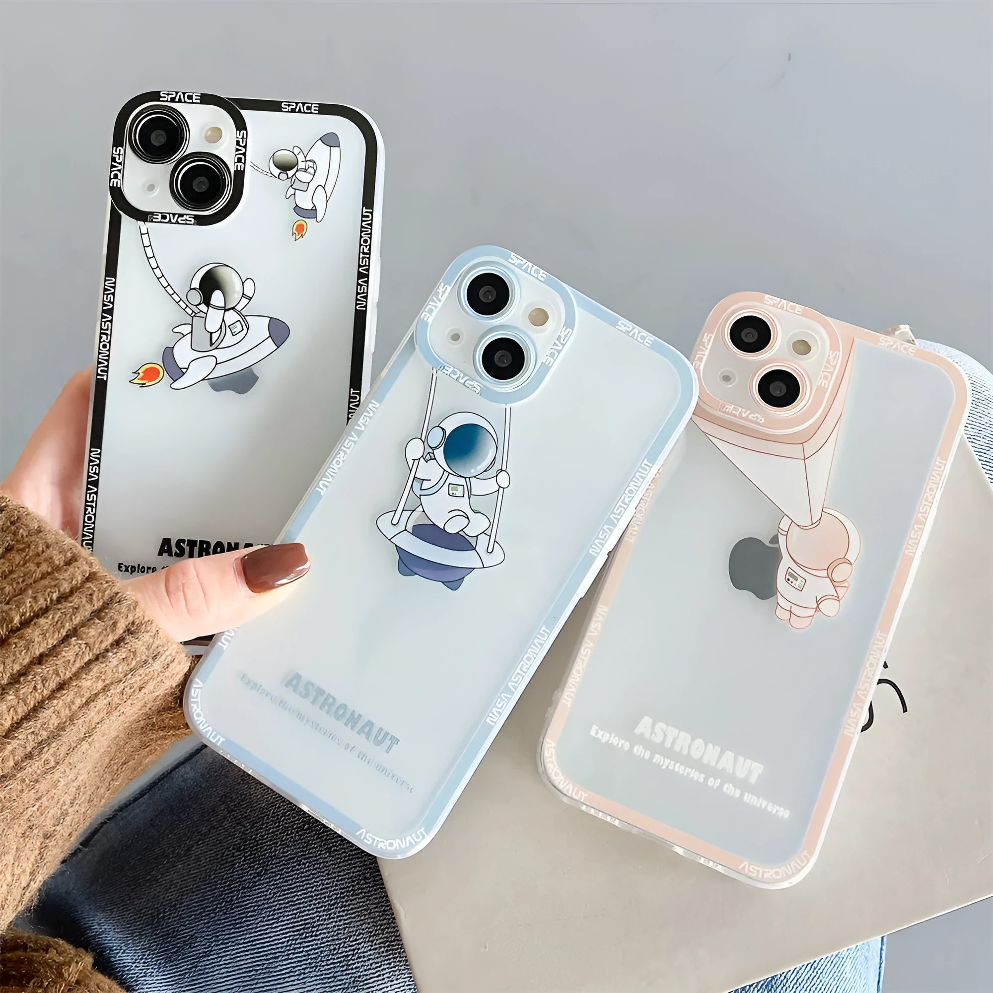 Transparent silicone phone case with astronaut print for iPhone models