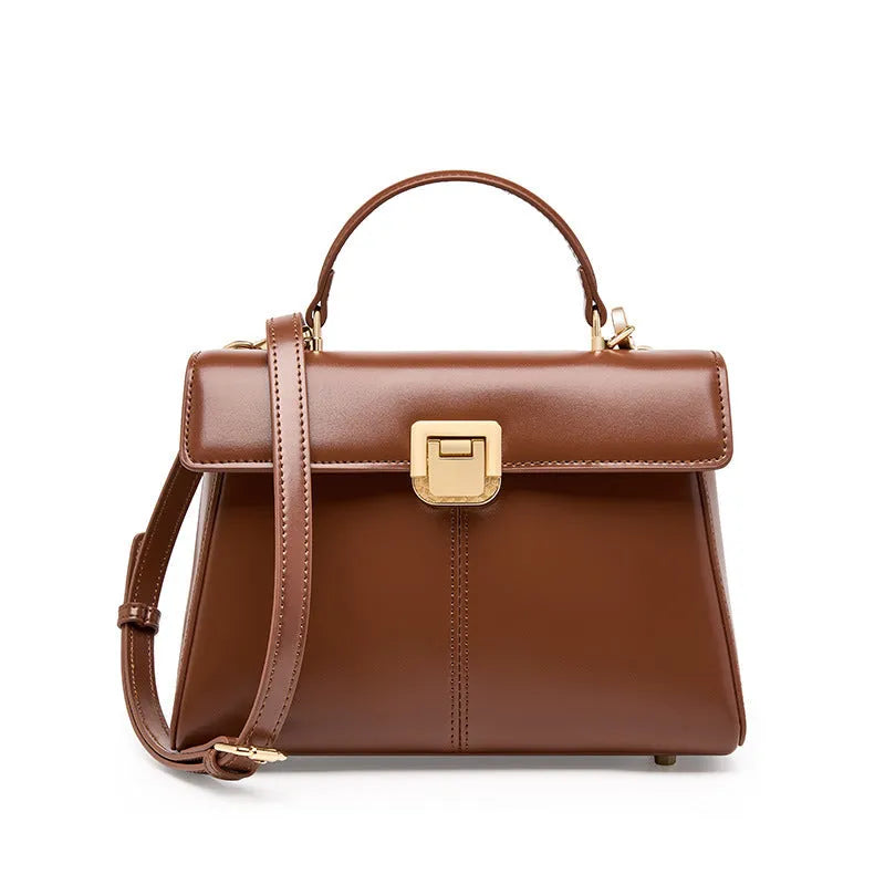 Genuine leather women's shoulder bag in horizontal square shape with adjustable strap.