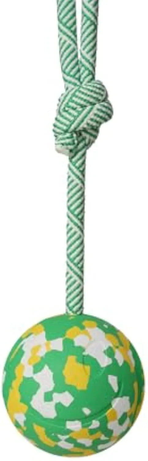 Natural rubber dog ball attached to nylon rope for interactive fetch and tug games