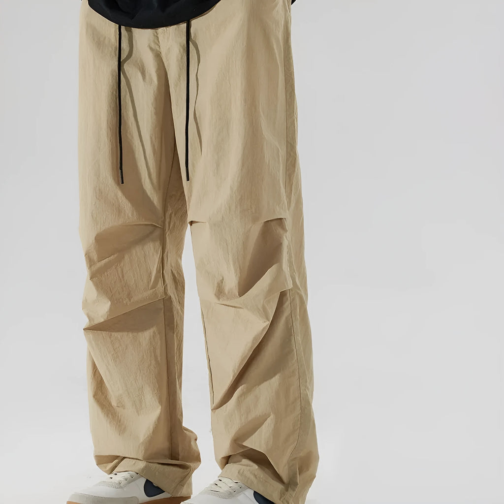 Men's loose straight-leg trousers in thin ice silk nylon fabric shown in multiple colour options