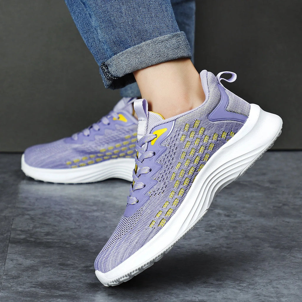 Women's lavender purple Flyknit running shoes with mesh lining and striped pattern
