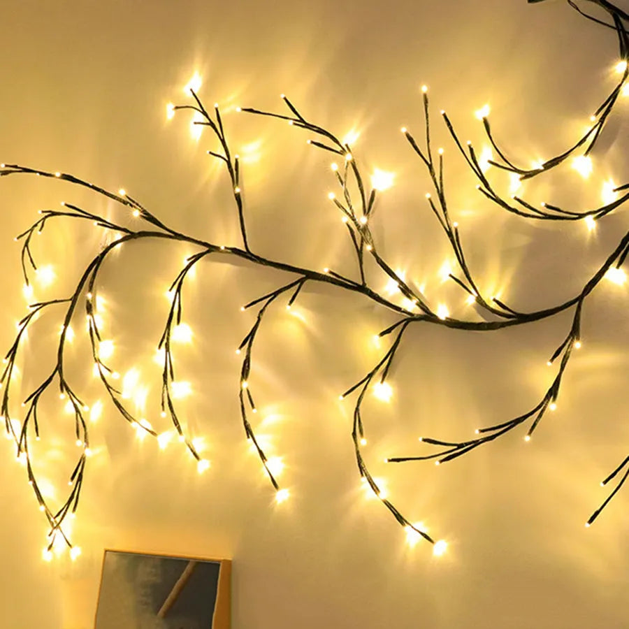 Flexible artificial willow vine LED garland with warm white lights on birch bark texture branches