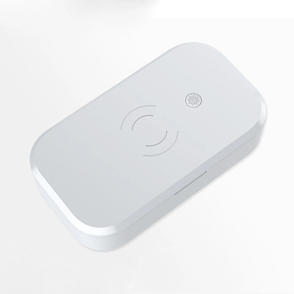 White ultraviolet disinfection box with wireless charging for nail tools and mobile phones