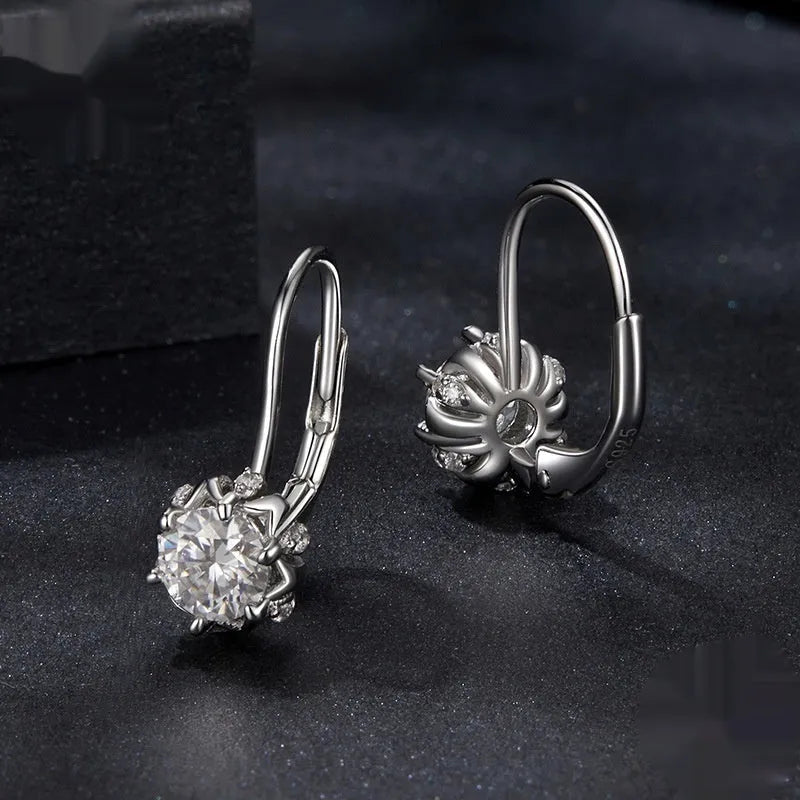Sterling silver flower bud ear clip with white gold plating and moissanite stones