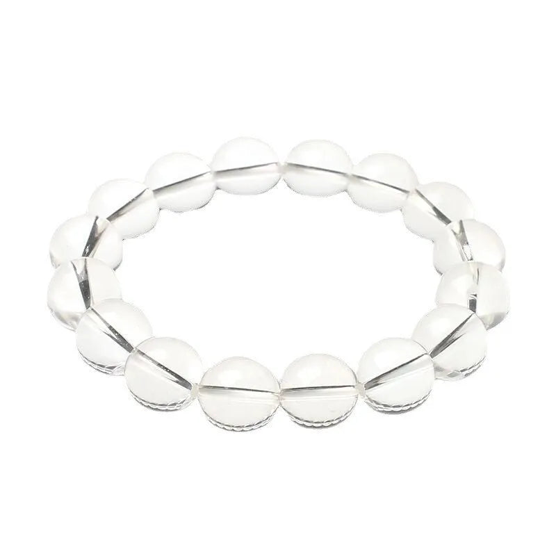Natural Donghai white water round crystal bead bracelet on a wrist, showing geometric style.