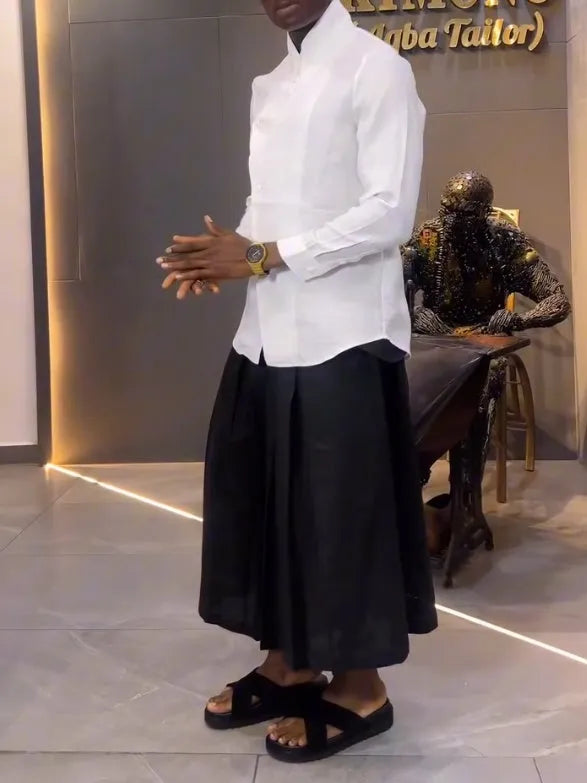 White asymmetric-front long sleeve shirt with black pleated trousers casual set