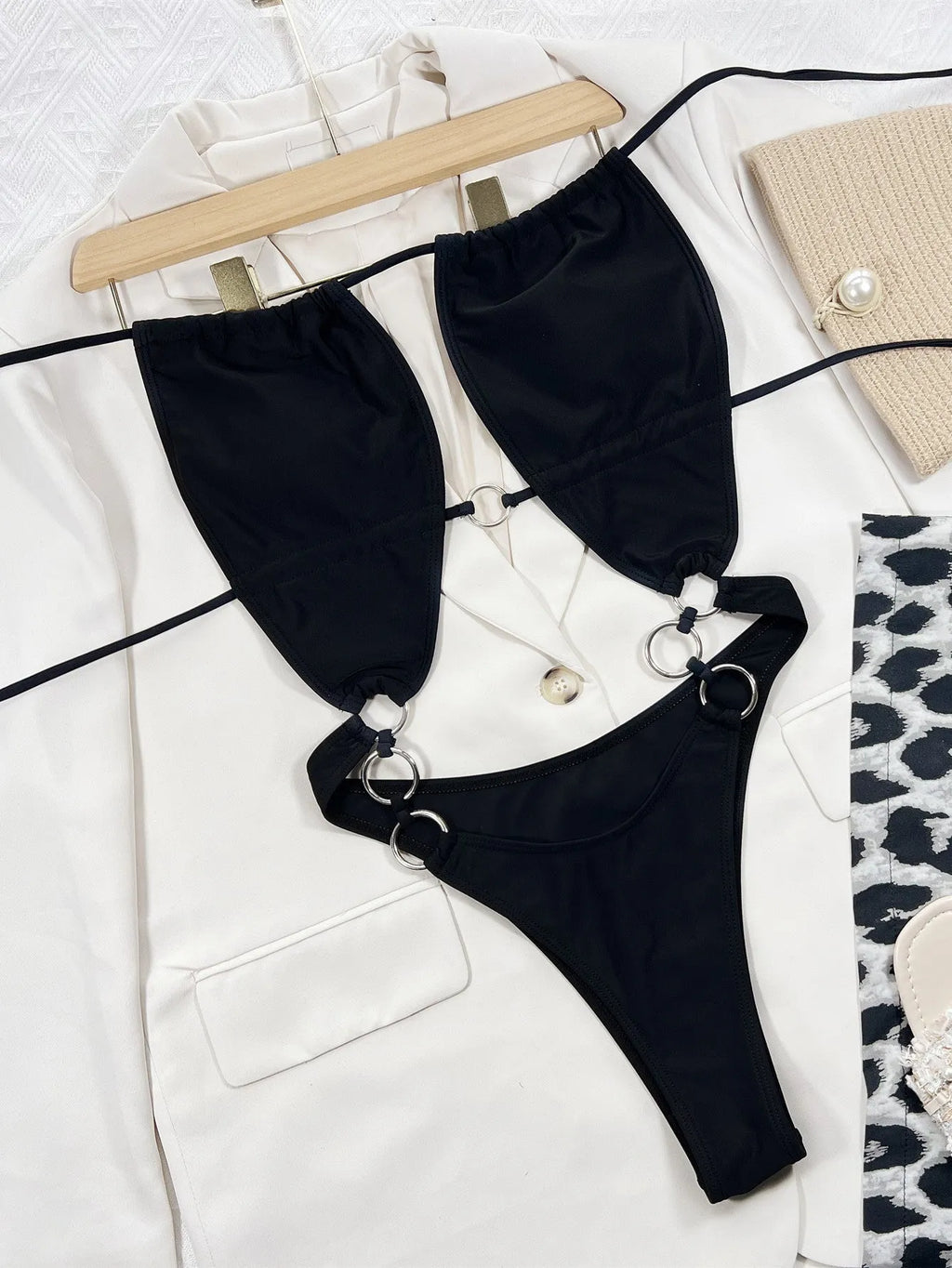 Black women's one-piece swimsuit with steel ring design, sleeveless nylon swimming costume