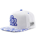 Black and white cotton baseball cap with letter embroidery on the front, showing adjustable strap.