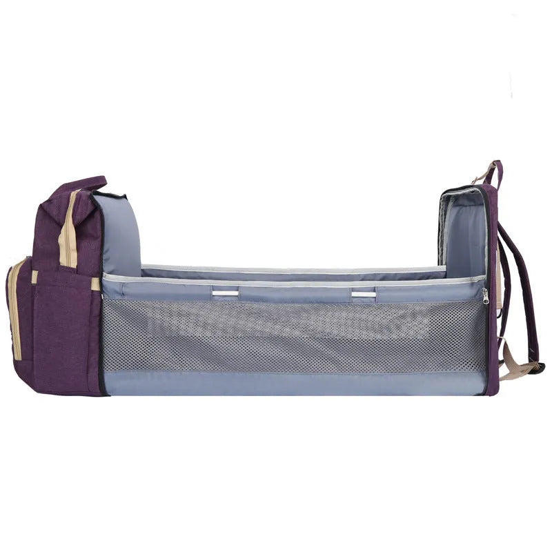 Portable folding crib mummy bag with curved shoulder strap in multiple colour options