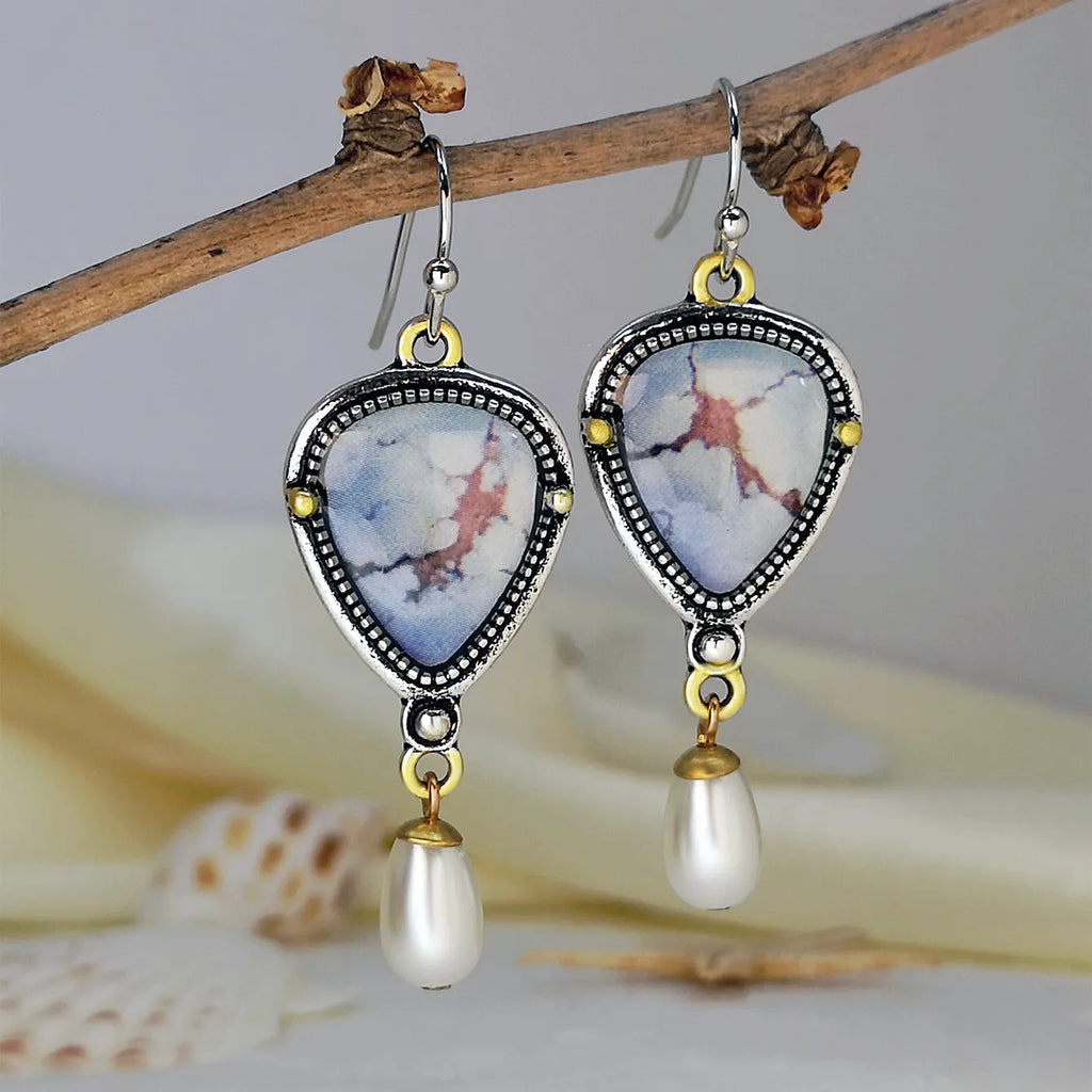Retro blue drop earrings with geometric design measuring 49mm long, featuring synthetic opal and pearl elements