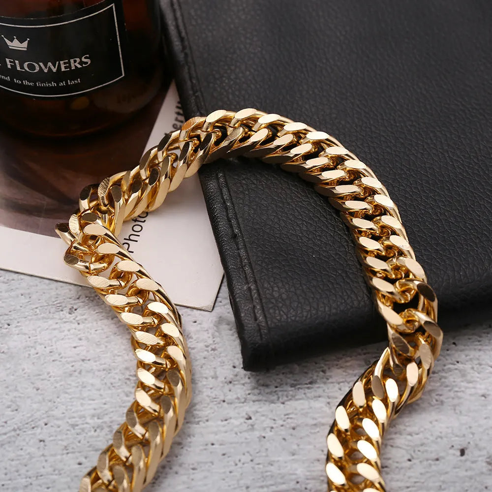 Women's gold thick chain necklace showing 32cm length with 6cm pendant detail