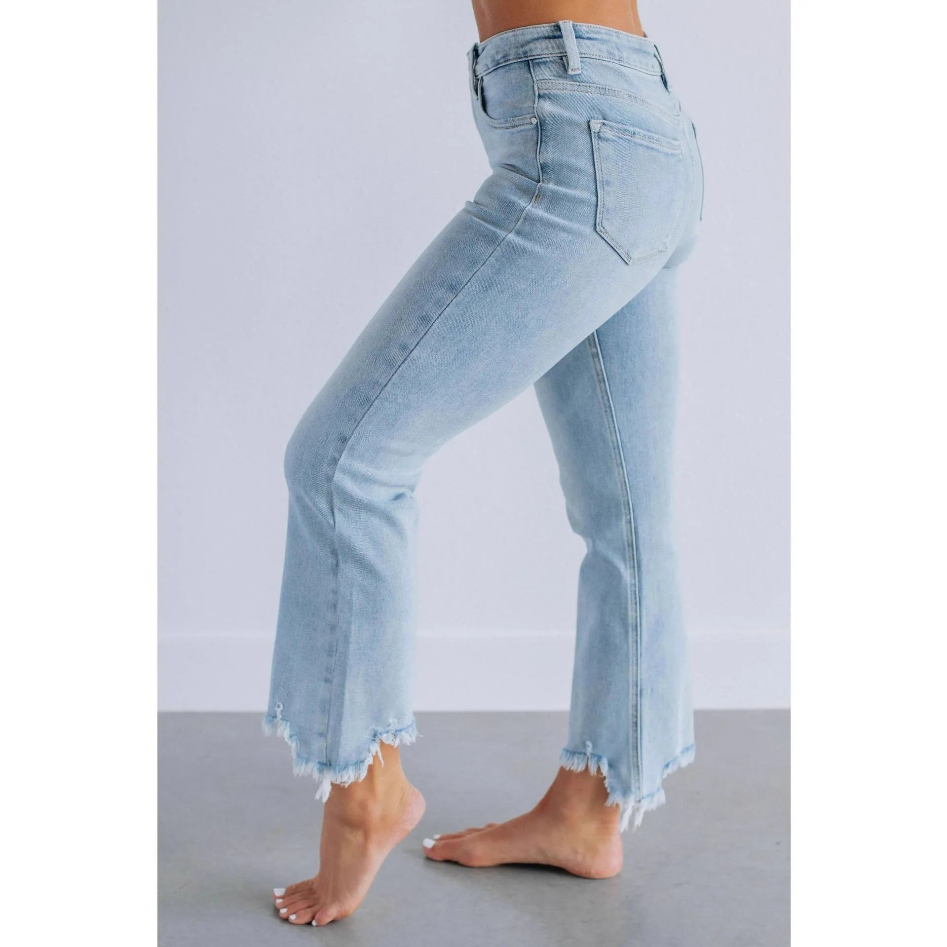 Casual women's denim trousers with hand-worn detailing in dark blue cotton fabric