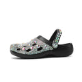 Black platform sandals for women with rhinestone detail on EVA upper and sole.