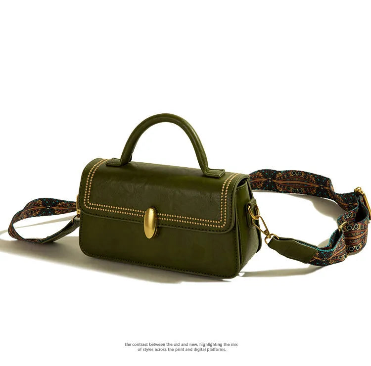 Women's brown retro messenger bag showing square vertical shape and adjustable shoulder strap