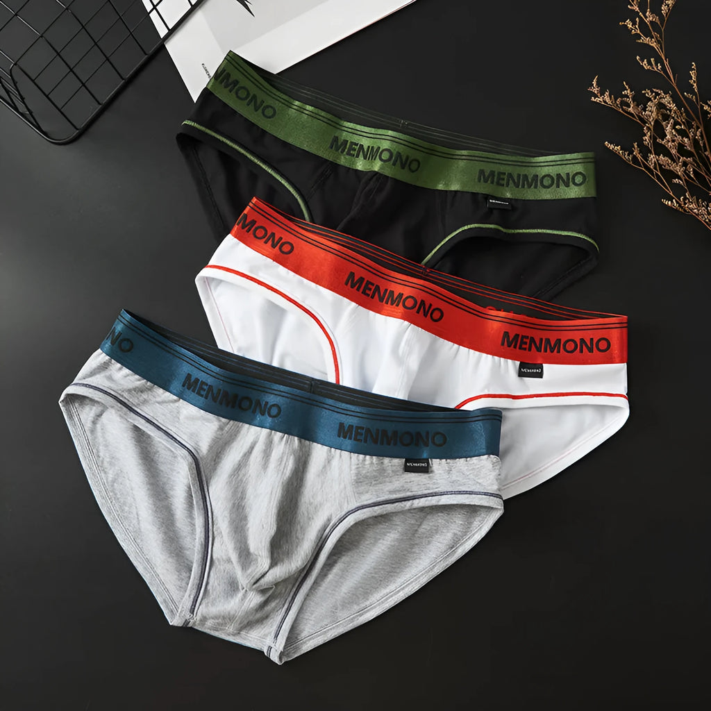 Men's solid colour cotton low waist briefs on a white background.