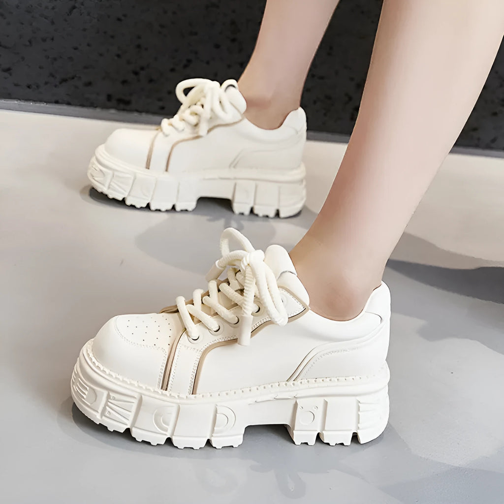 Women's beige and pink muffin bottom leather casual shoes with a rubber foam sole.