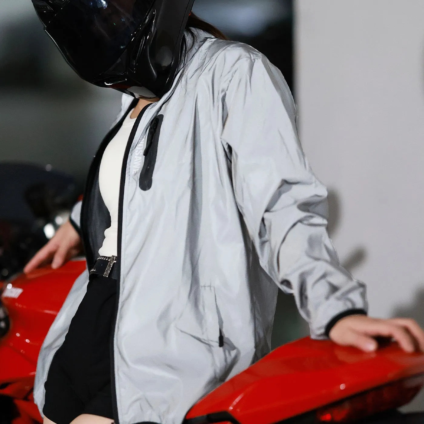 Silver long sleeved waterproof windproof polyester coat for men and women.