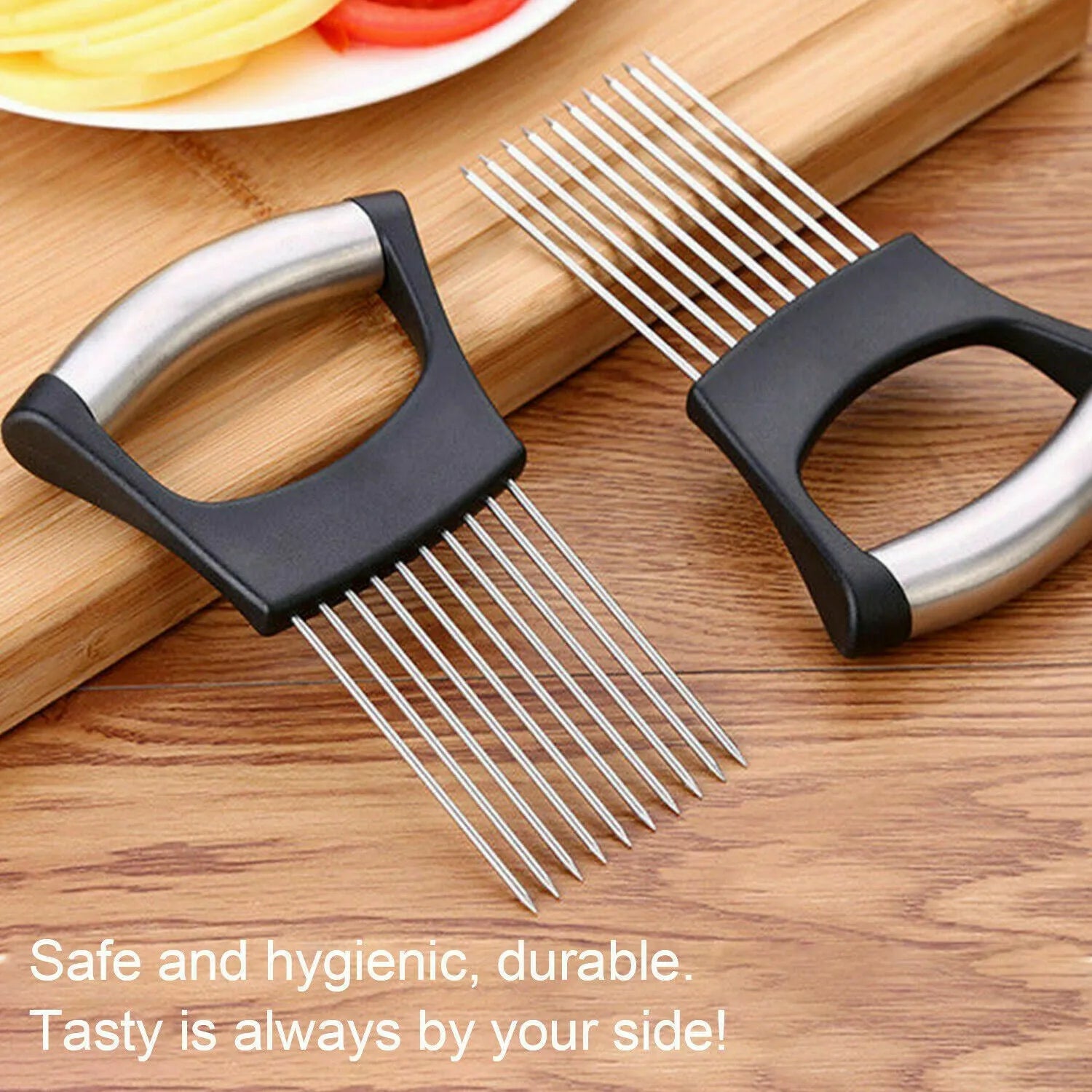Stainless steel and ABS food slice assistant for onions and tomatoes on a kitchen worktop.