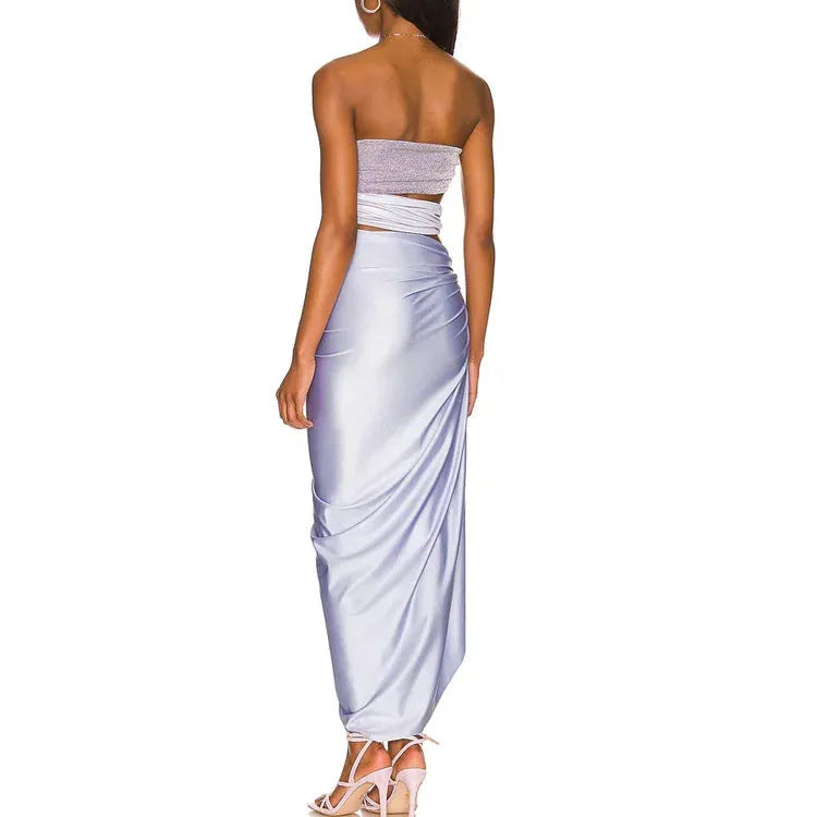 Purple one-piece swimsuit with matching wrap skirt set on mannequin