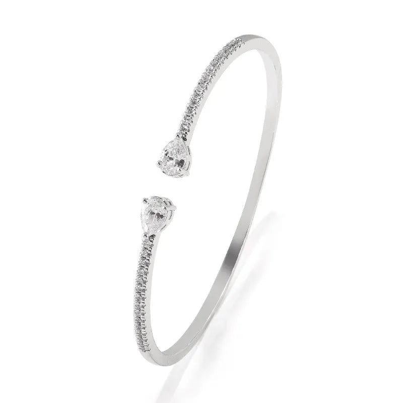 Copper bracelet with inlaid white zircon stones in simple jewellery design