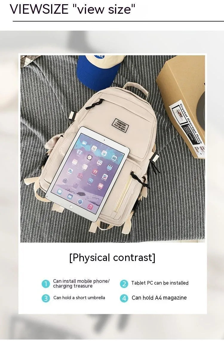 Black student backpack with three-dimensional pockets showing computer compartment