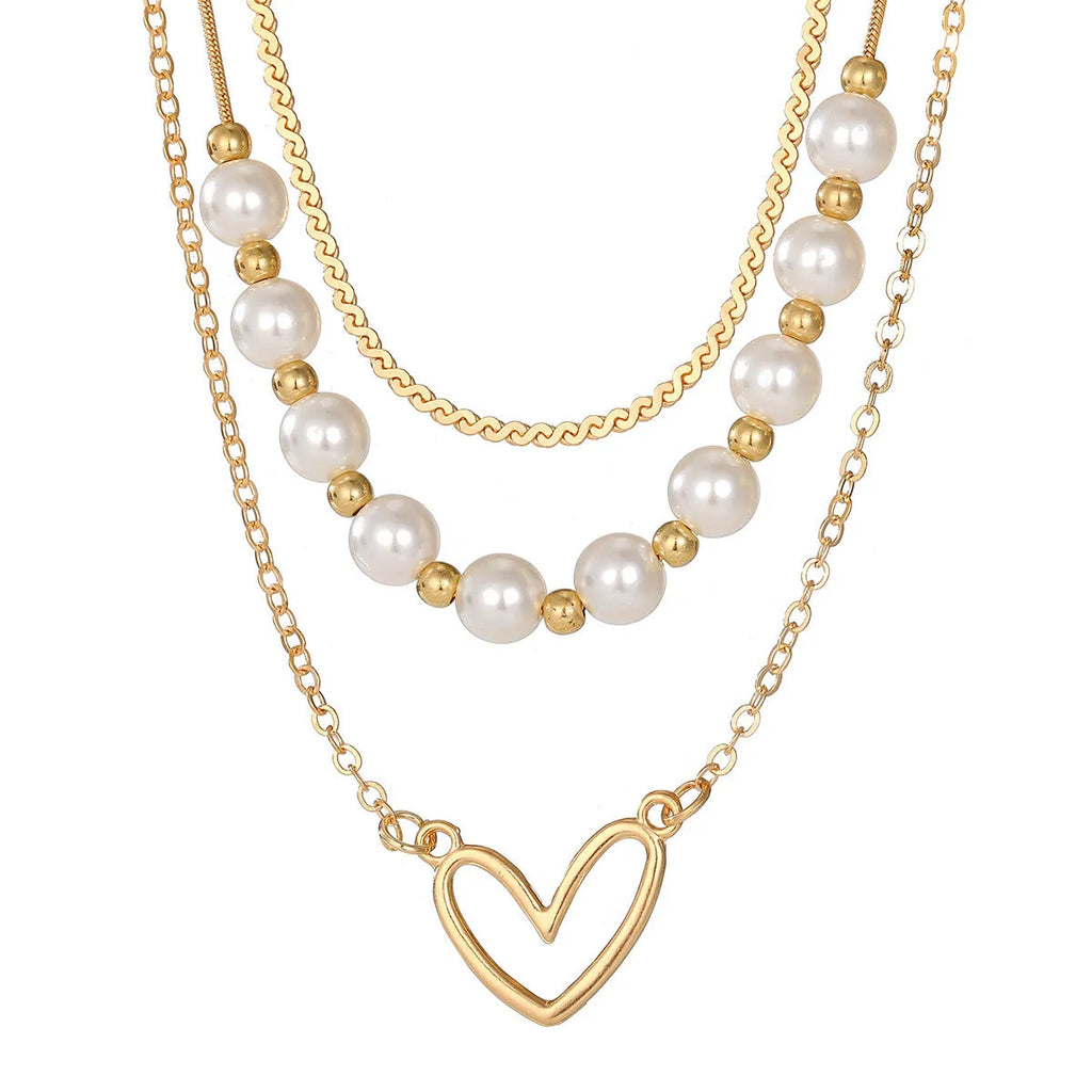 Vintage gold heart pendant necklace with pearl chain design in three colour options
