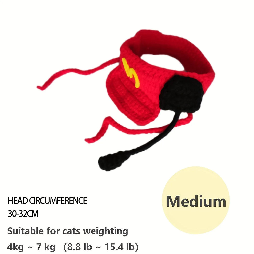Handmade chef hat and cotton knitted sweater costume on a small cat