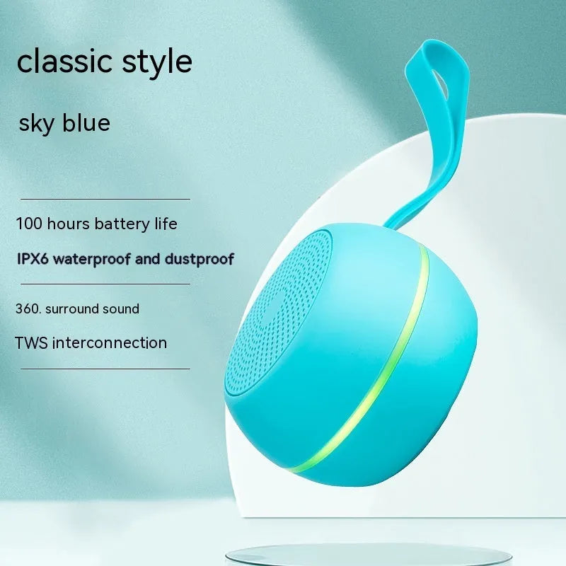 Mini Bluetooth speaker in red with waterproof and drop-resistant plastic body and voice prompt function