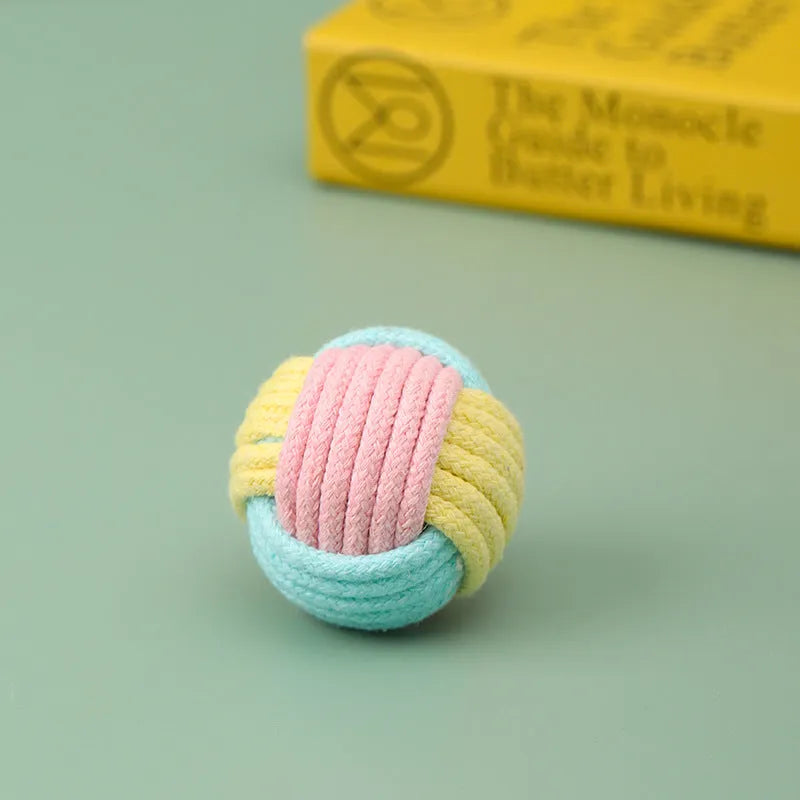 Handmade cotton plush ball cat chew toy measuring 5cm in diameter with textured surface