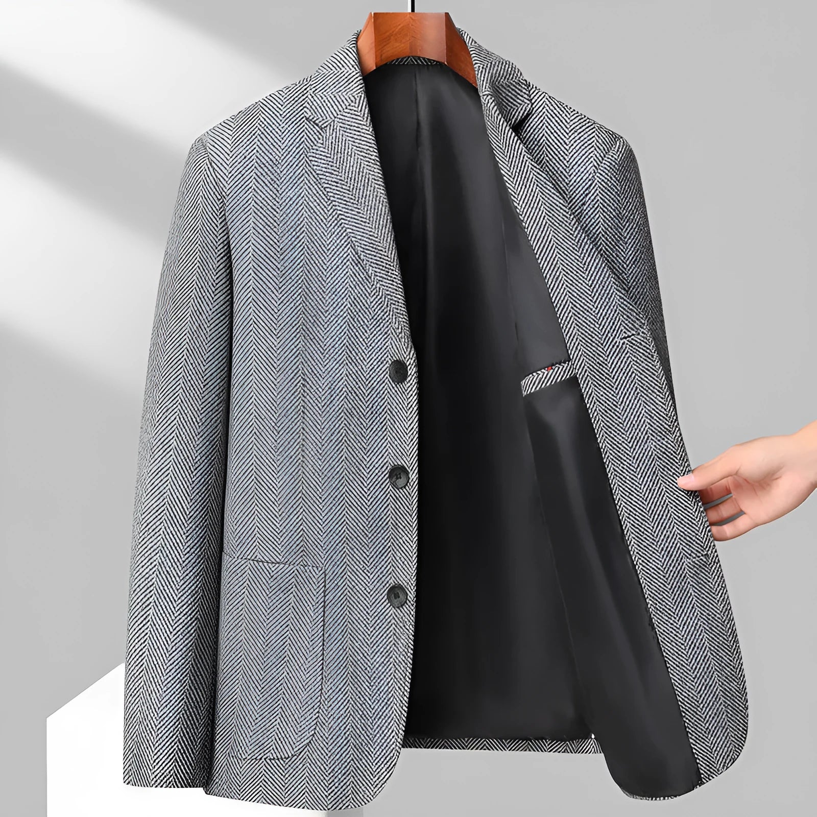 Men's solid colour loose fit woolen coat for casual spring and autumn wear.