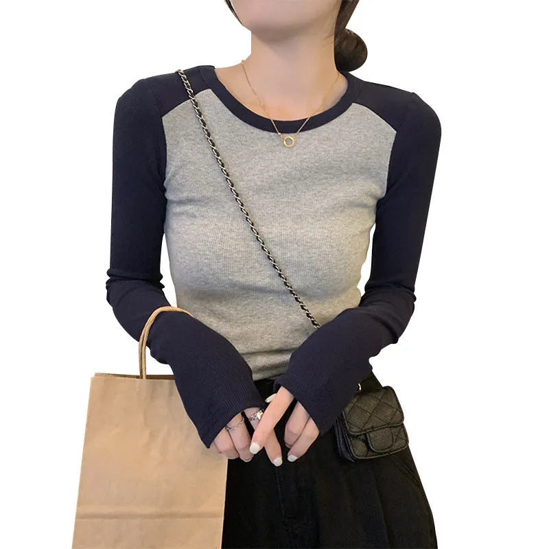 Women's slim fit viscose top with princess sleeves in short length showing embroidery detail