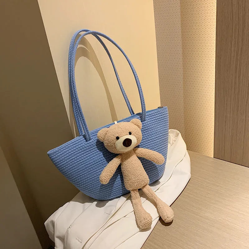 Woven cotton linen dumpling-shaped bag with three-dimensional pocket in khaki colour