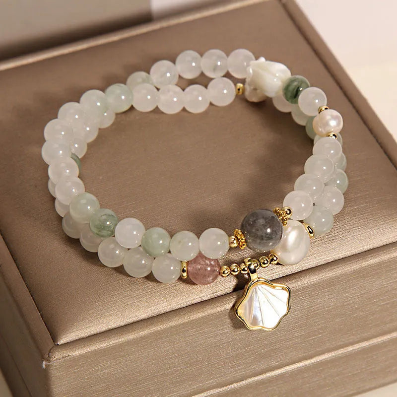 Women's crystal bracelet with Tianshan jade ginkgo leaf pendant and gold-plated gemstone settings