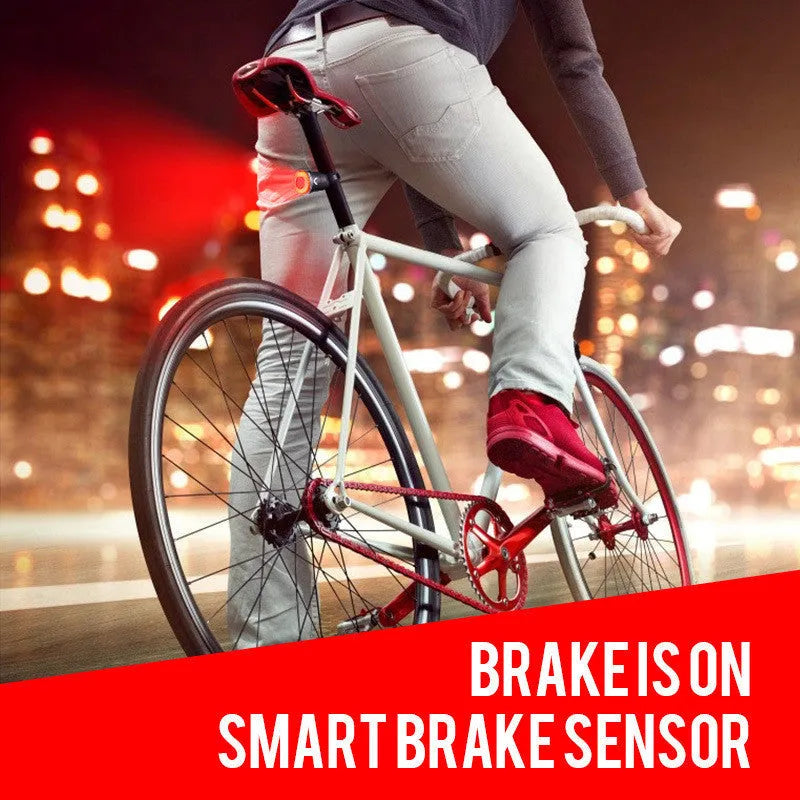 Black aluminium smart brake sensing USB rechargeable bicycle taillight showing compact size.