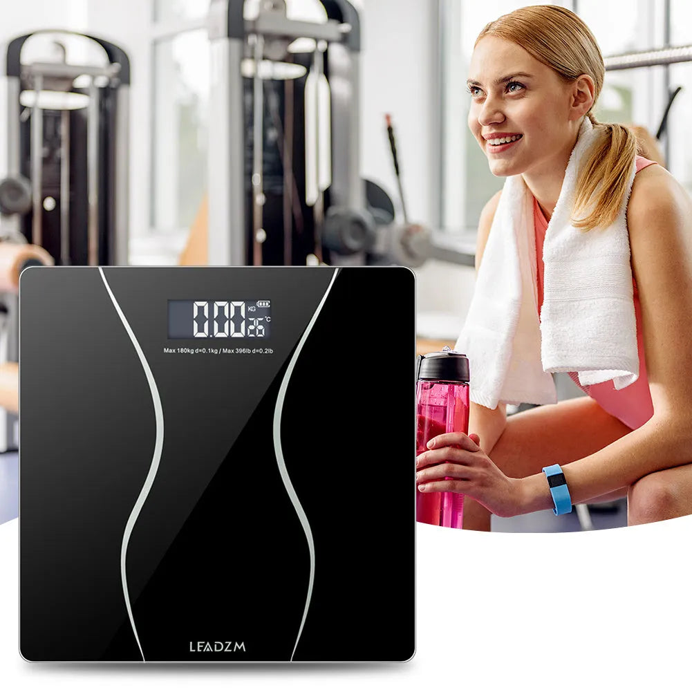 Black electronic body scale with digital display for weight measurement up to 180kg