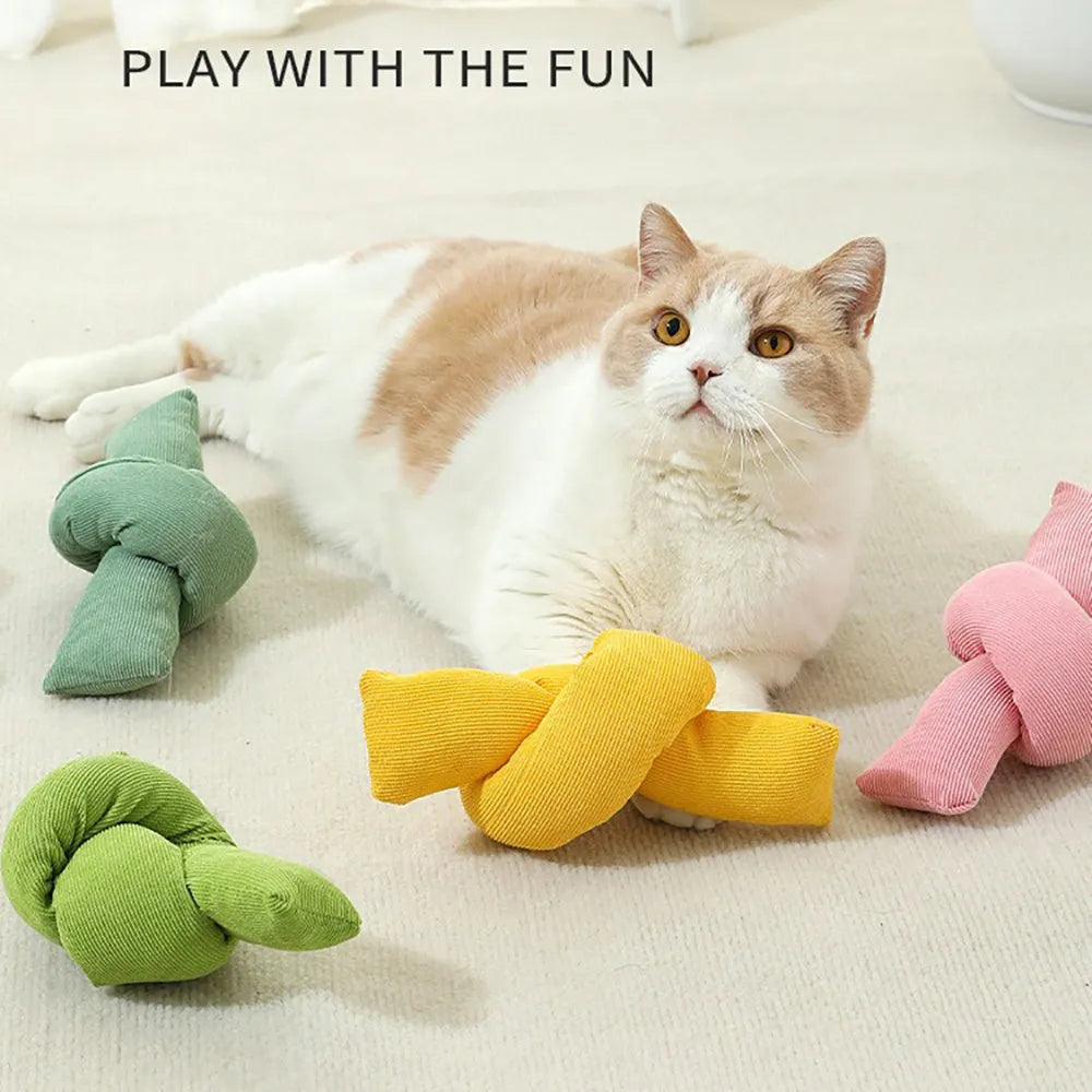 White cotton dog rope toy with multiple sturdy knots for tugging and chewing