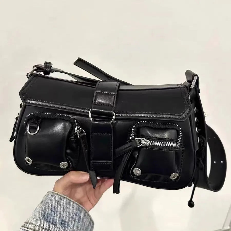 Black PU leather underarm baguette messenger bag with adjustable crossbody strap showing compact dimensions