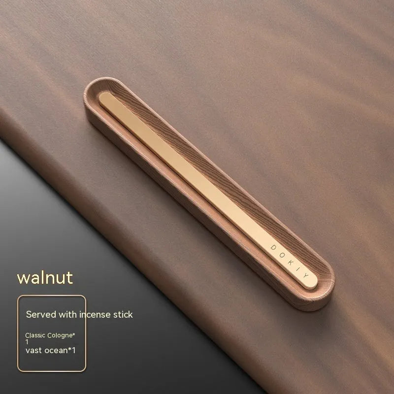 Car aromatherapy ornament in long strip design for air vent placement in walnut wood or metallic grey colour