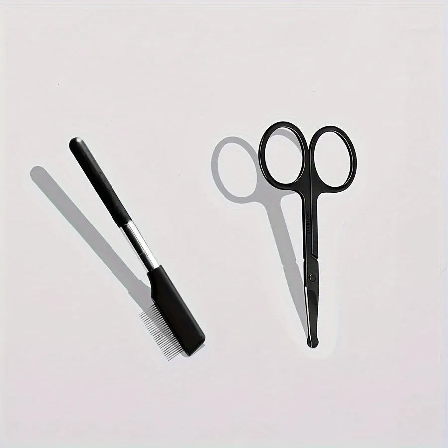 Black dual-ended pet grooming brush with soft silicone stain remover and plastic comb.