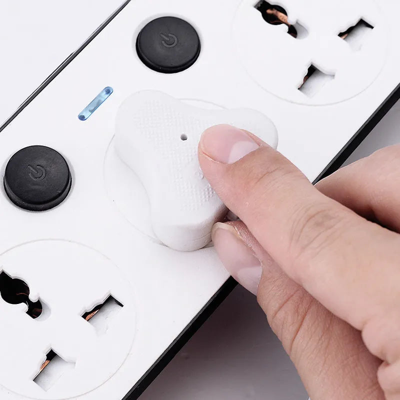 Multi-switch USB power strip compatible with international plugs on a desk.