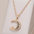 Rose gold star moon pendant necklace with zircon crystals and enamel detailing on water wave chain