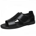 Men's black leather Roman sandals with open-toe design and rubber sole