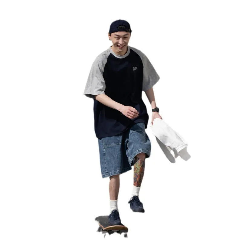 Men's blue Japanese junior style raglan sleeve t-shirt with loose fit on hanger
