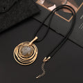 Vintage gold women's necklace with large round plaid pendant on a snake skin chain, shown at adjustable length.
